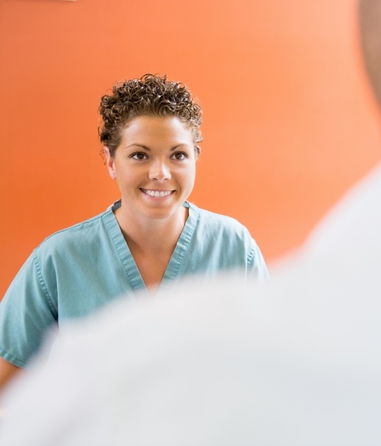 Chicago dental team member smiling at a patient