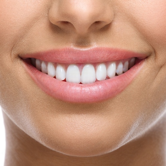 Close up of person smiling with even gumline