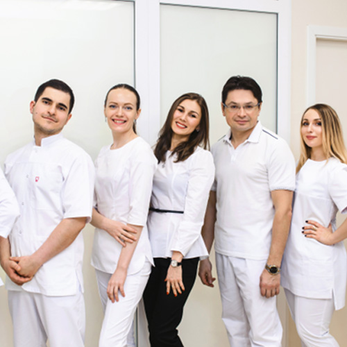 Dental team members standing in a row