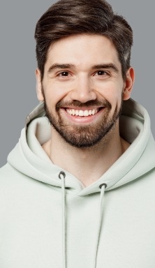 Smiling young man in hoodie