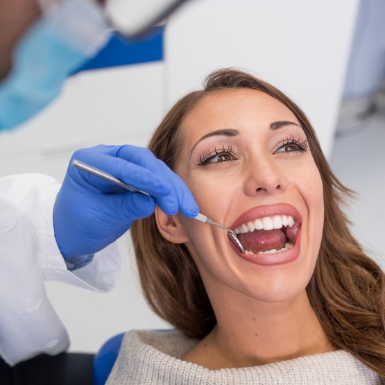 Woman receiving a dental checkup